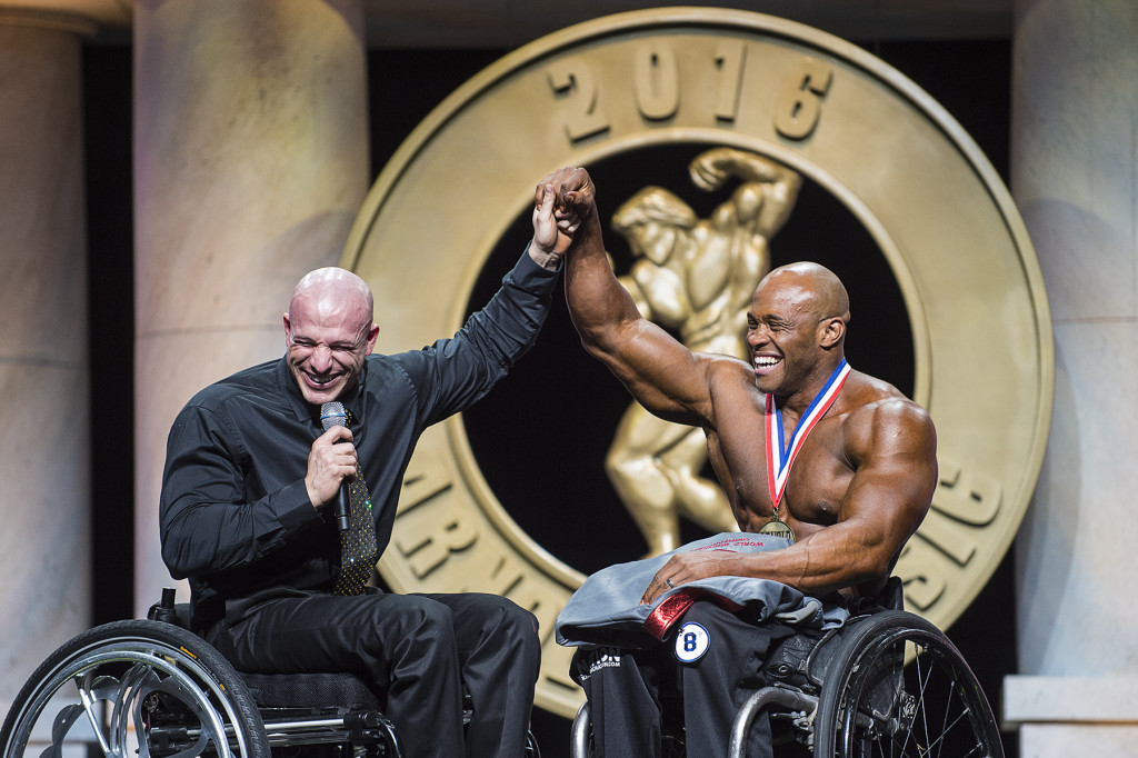 Arnold Classic Pro Wheelchair winner Harold Kelley (right) with event Director Nick Scott (left)