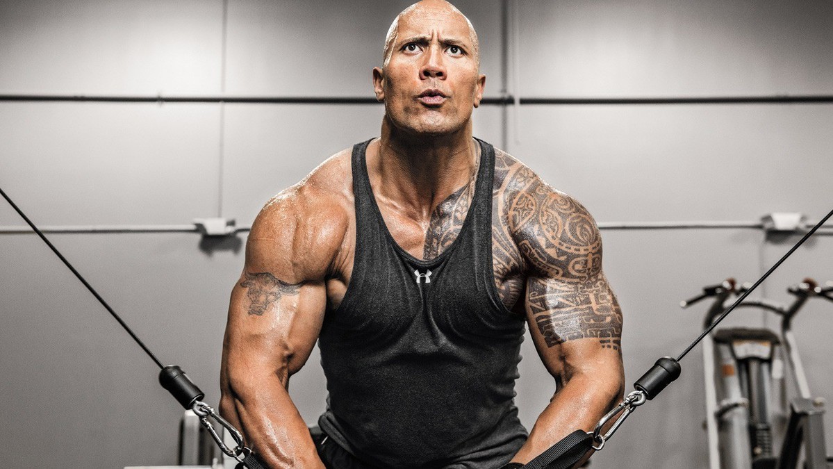 The Rock Then & Now: Photos Of Dwayne Johnson's Transformation